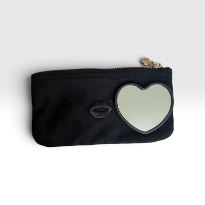 Mirror with All Black Mini Pout Pouch