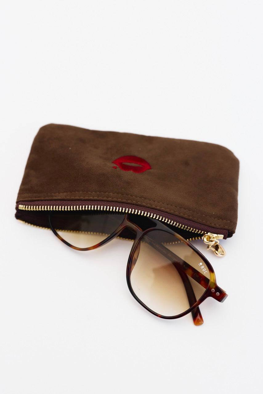 Chocolate Pout Pouch velvet pouch holding sunglasses and small essentials