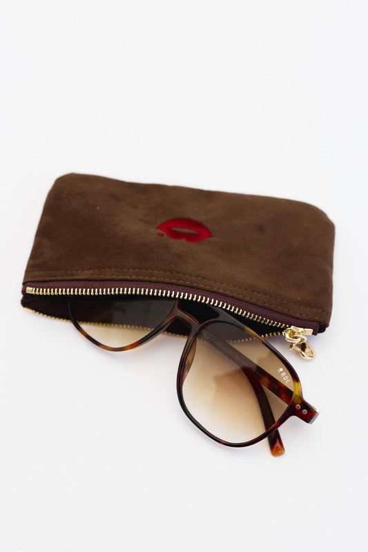 Chocolate Pout Pouch velvet pouch holding sunglasses and small essentials