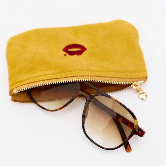 Mustard Pout Pouch velvet pouch holding glasses and essentials