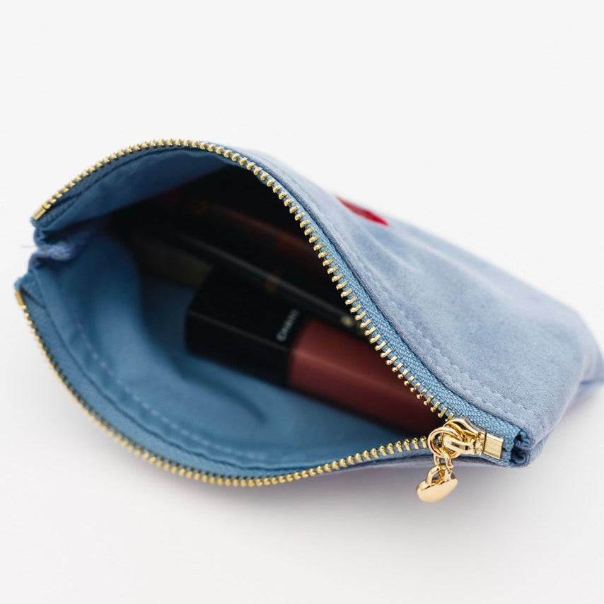 Powder blue Pout Pouch velvet makeup pouch holding lipstick